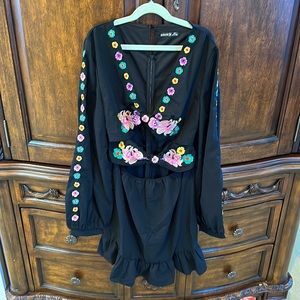 Black embroidered ruffle hem dress